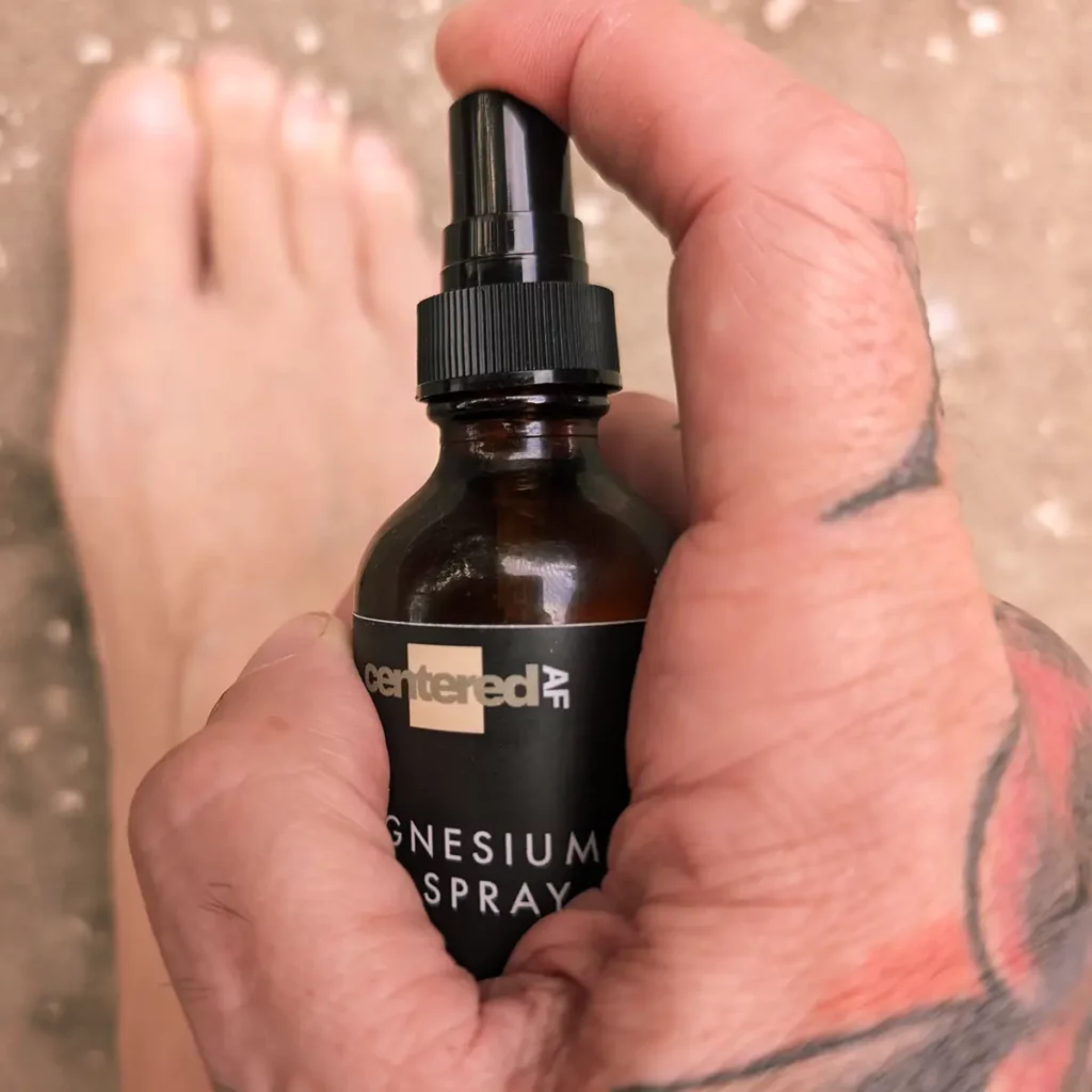 Centered AF Magnesium Oil Spray on Feet for Better Sleep